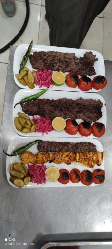 عکس تهیه غذای شمس العماره