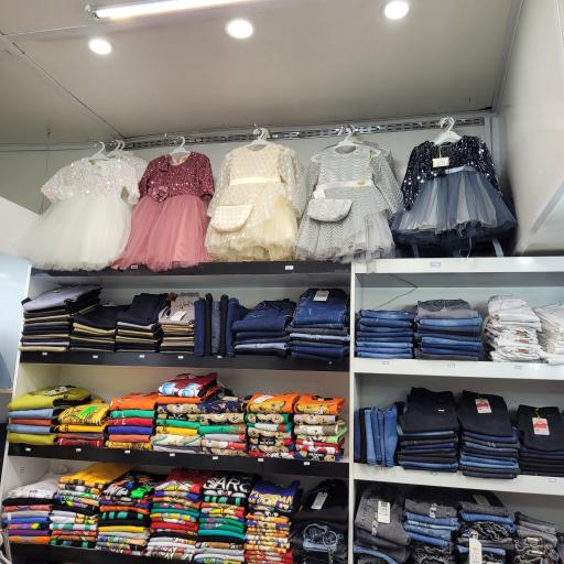 عکس پوشاک کودک و نوجوان وروجک