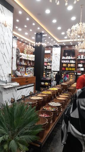 عکس شیرینی سرای باران