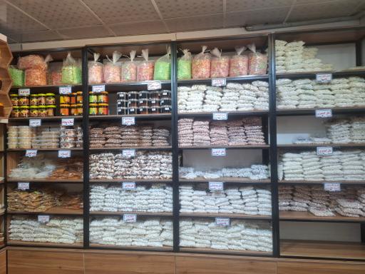 محصولات شکری و کنجدی آقو (سوغات نهاوند)