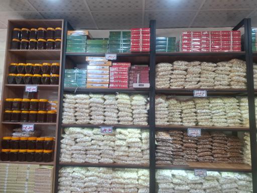 محصولات شکری و کنجدی آقو (سوغات نهاوند)
