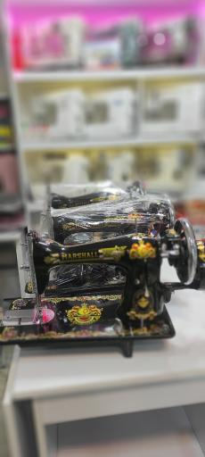 عکس فروشگاه چرخ خیاطی ترمه طلا 