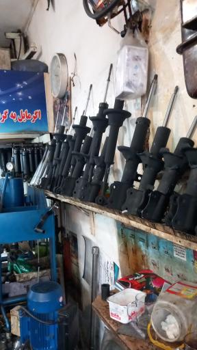 عکس کمک فنر سازی حسین