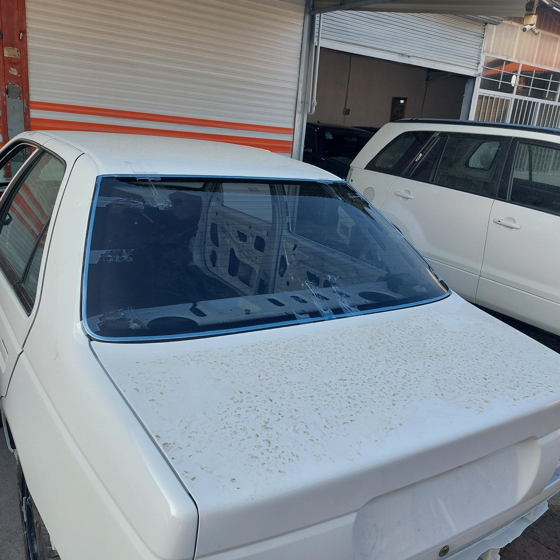 عکس پخش ونصب شیشه اتومبیل قائم 