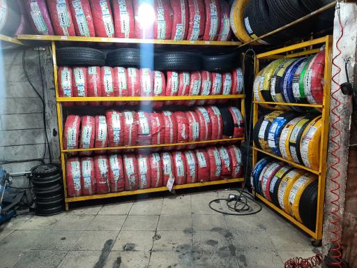 عکس لاستیک فروشی و آپارات نوبخت