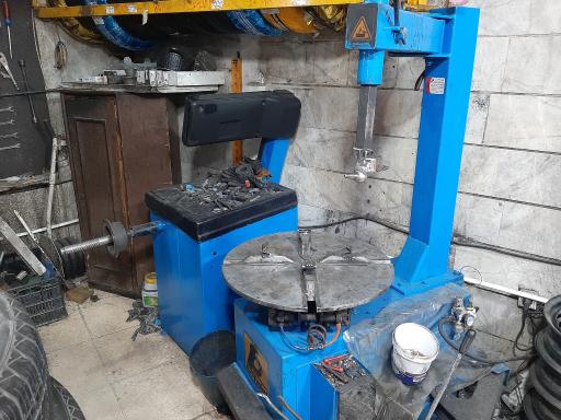 عکس لاستیک فروشی و آپارات نوبخت