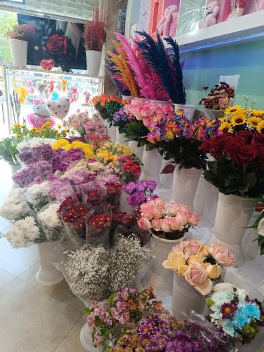 عکس گلفروشی گل روی تو