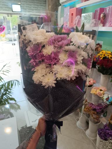 عکس گلفروشی گل روی تو