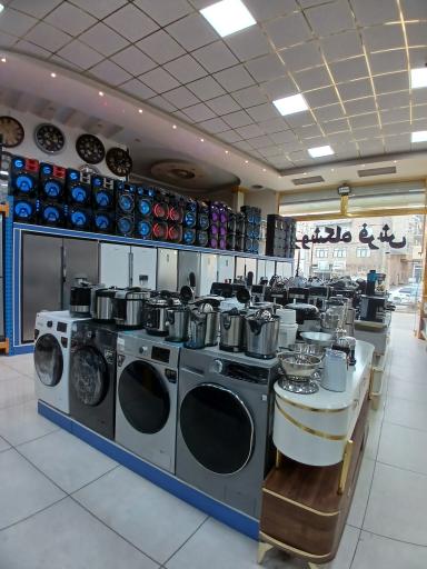 عکس لوازم خانگی و فرش میرزازاده 