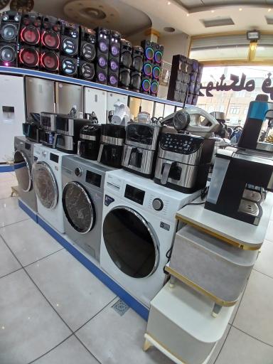 عکس لوازم خانگی و فرش میرزازاده 