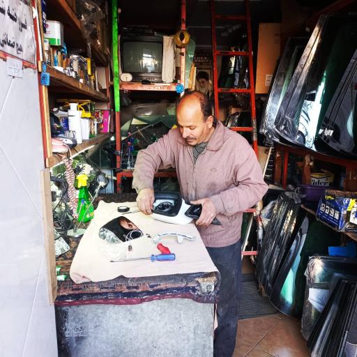 عکس شیشه اتومبیل علی فرامرزی