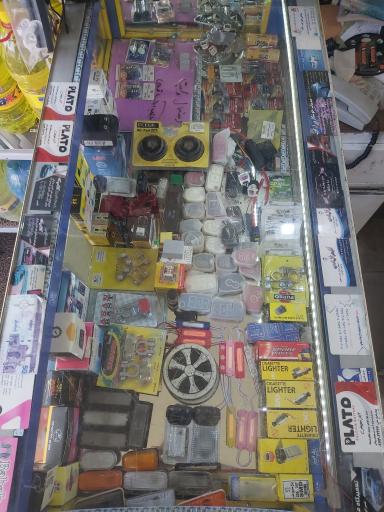 عکس باطری فروشی و لوازم برقی خودرو