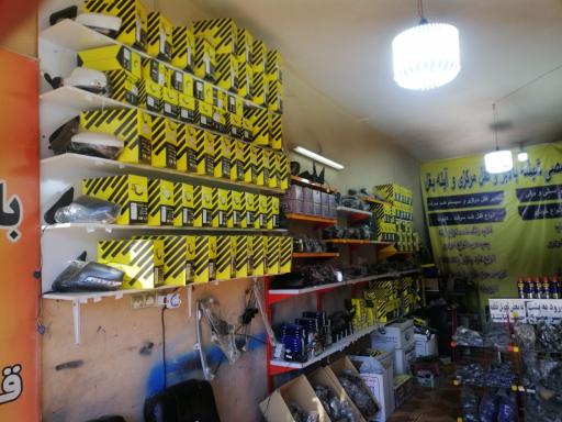 عکس شیشه بالابر برقی و آینه بغل خانزاد 