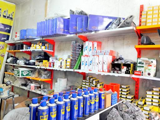 عکس شیشه بالابر برقی و آینه بغل خانزاد 