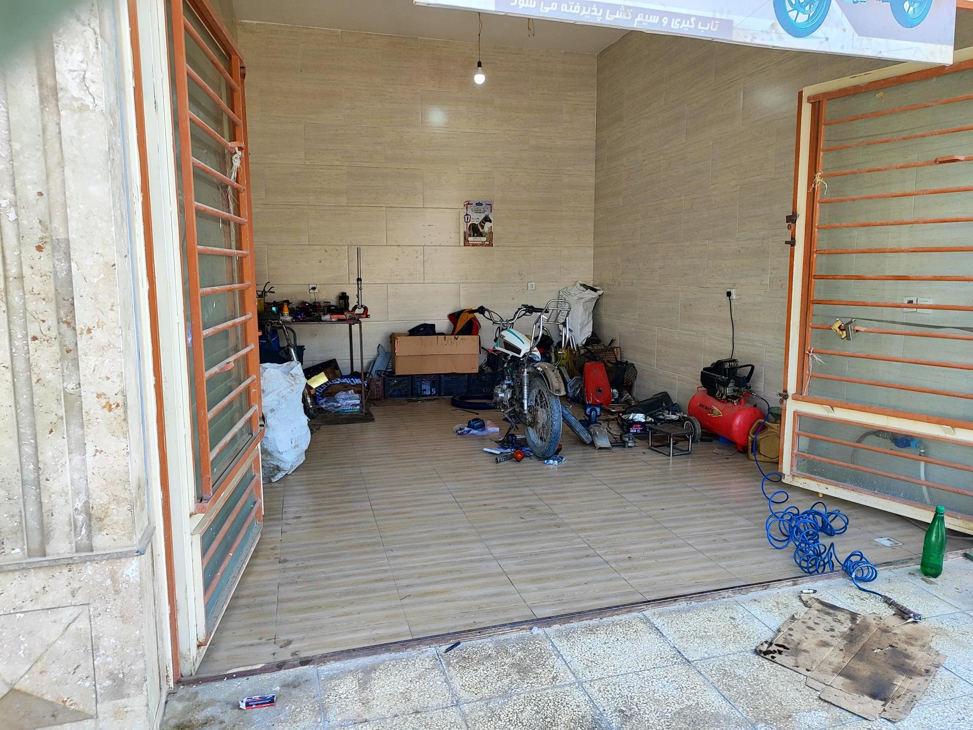 عکس تعمیرگاه موتور سیکلت اسماعیل