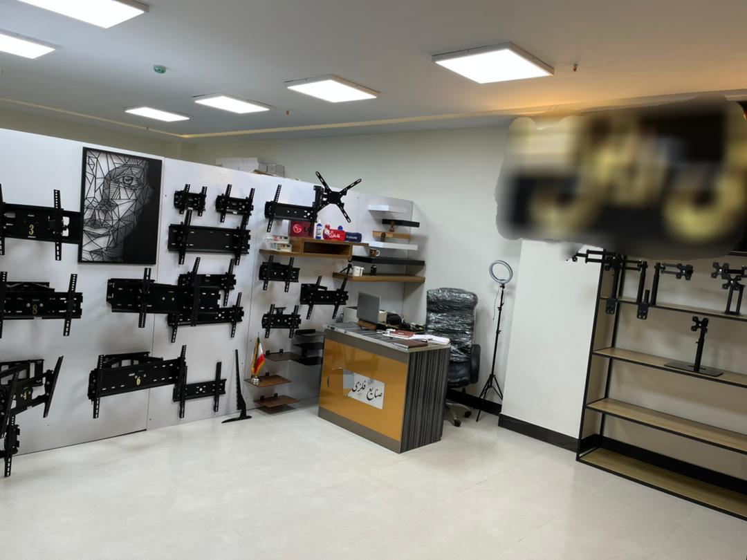 عکس فروشگاه پایه دیواری تلویزیون 