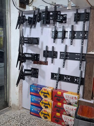 عکس فروشگاه پایه دیواری تلویزیون 