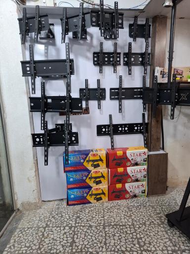 عکس فروشگاه پایه دیواری تلویزیون 