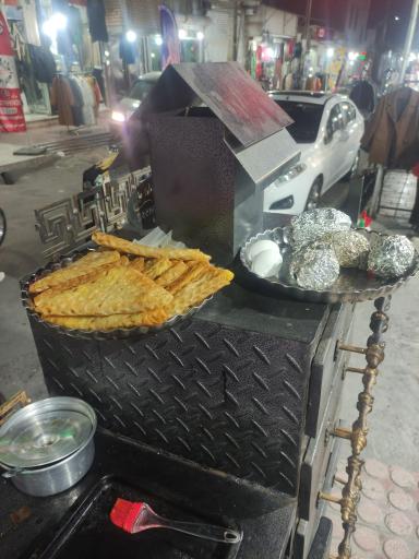 عکس بلال تنوری (لقمه سیب زمینی تخم مرغ)