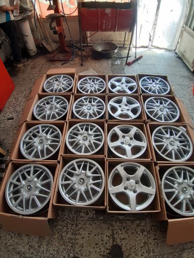 عکس پنچرگیری و تعویض روغن و لاستیک فروشی پاسارگاد