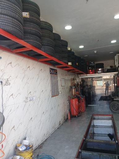 عکس پنچرگیری و تعویض روغن و لاستیک فروشی پاسارگاد