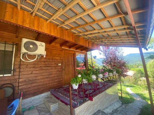 عکس کلبه چوبی سیروس نجفی 