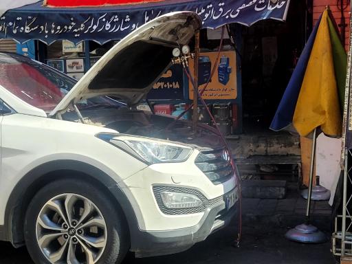 عکس خدمات برق خودرو باطری سازی قائم