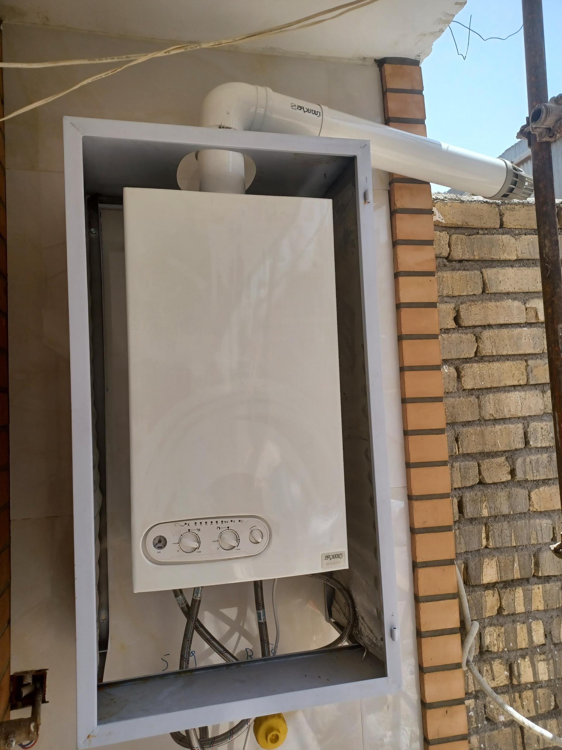 عکس نصب و تعمیرات پکیج و کولر گازی کیان