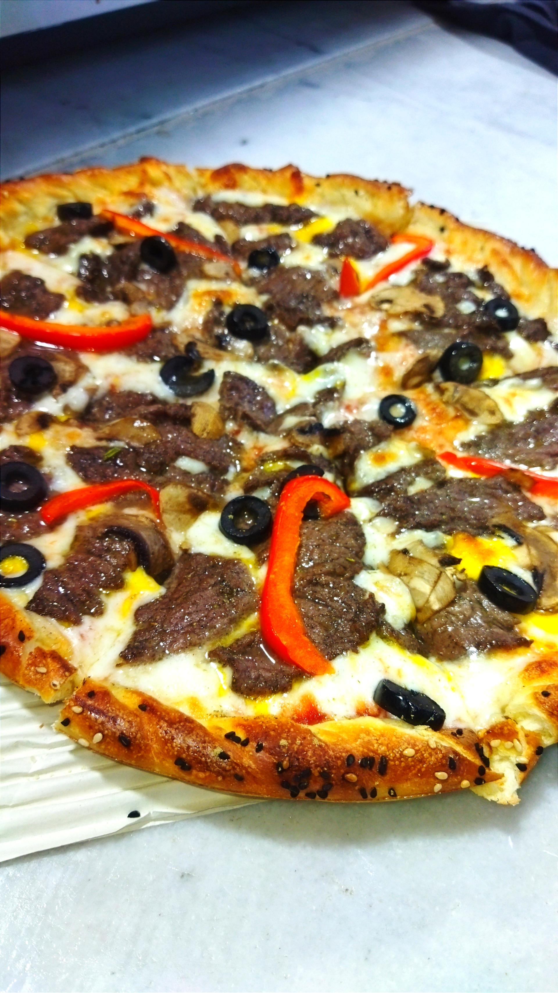 عکس پیتزا لند