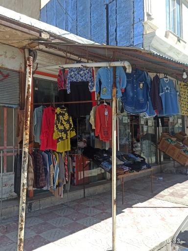عکس لباس فروشی نقدیان