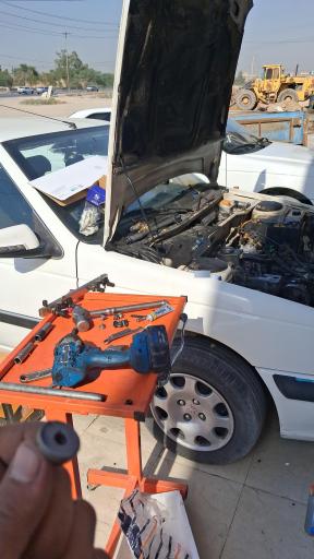 عکس تعمیرگاه مکانیکی رزیج