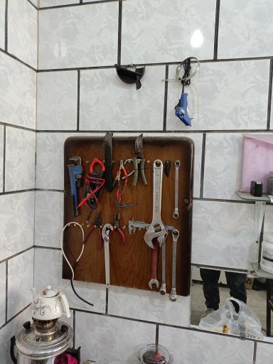 عکس تعمیر لوازم خانگی استاد کار