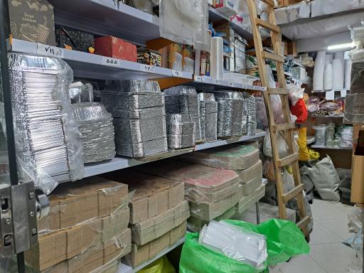 عکس پلاستیک شاددل مرکز کارتن پیتزا و ظروف یکبار مصرف