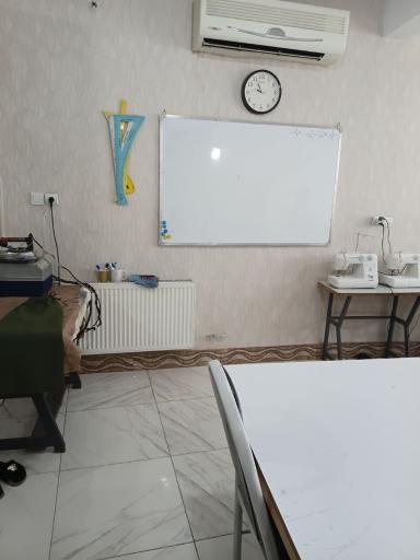 عکس  آموزشگاه خیاطی آمال