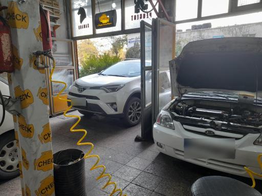 عکس تعمیرگاه و تست موتور آلپ