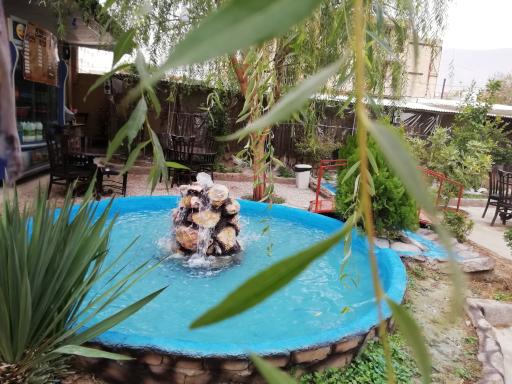 عکس رستوران باغ و آلاچیق طاق بستان