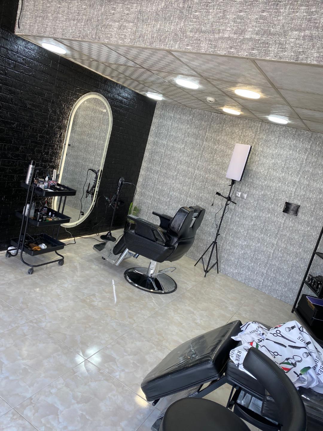 عکس پیرایش متین تاج‌بخش