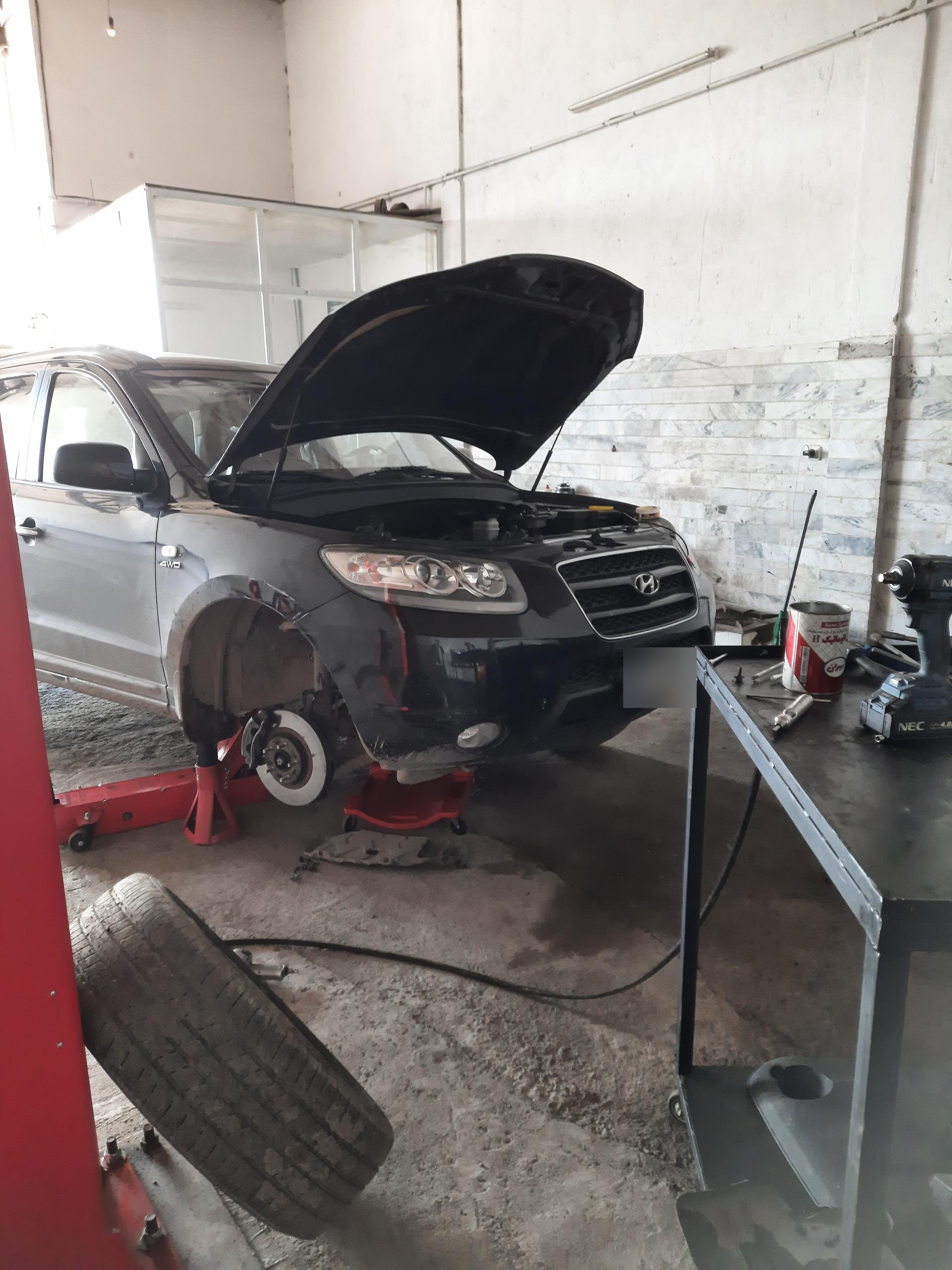 عکس تعمیرگاه فوق تخصصی هیوندای کیا