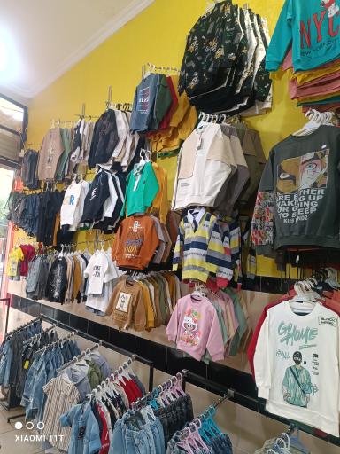 عکس پوشاک بچگانه شاین