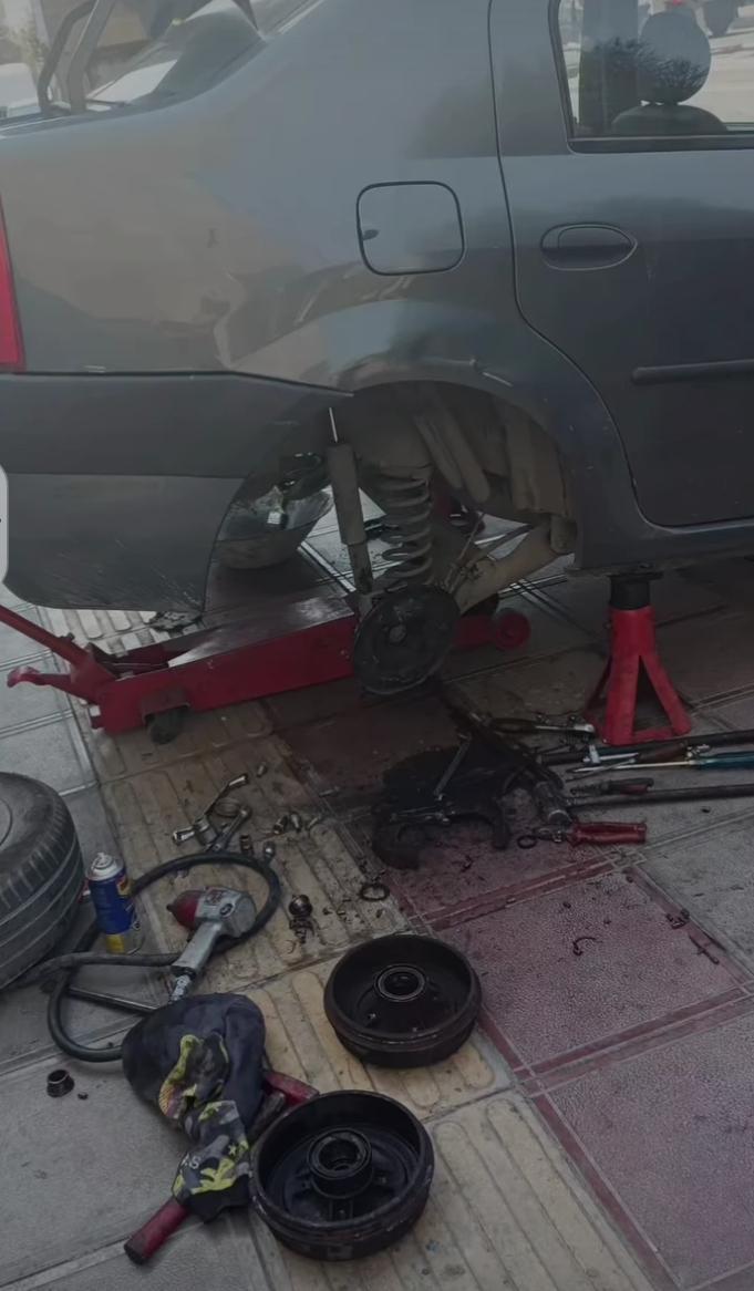 عکس تعمیرگاه اطمینان