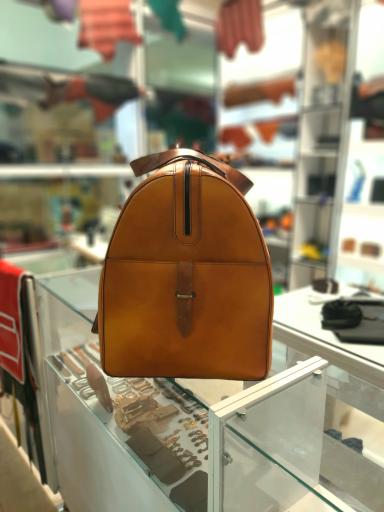 عکس فروشگاه باوند چرم