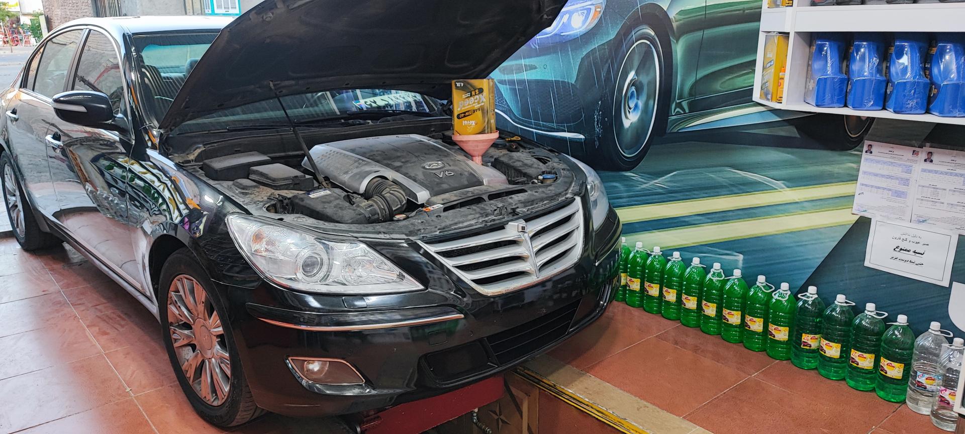 عکس تعویض روغن و پنچرگیری علی