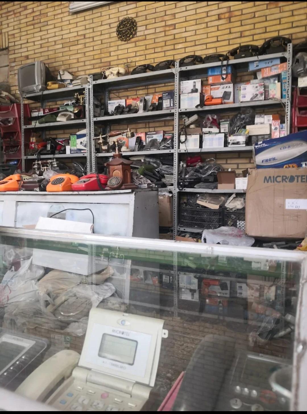 عکس تعمیر تلفن و فاکس منصوری