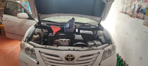 عکس تعویض روغن و پنچرگیری علی