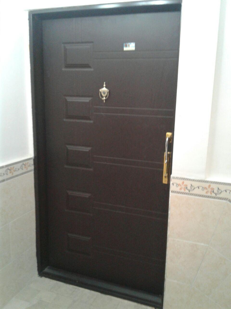 عکس درب چوبی صداقت علی یاری