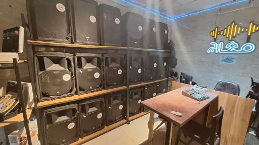 عکس فروشگاه باند و دستگاه صوتی معارج