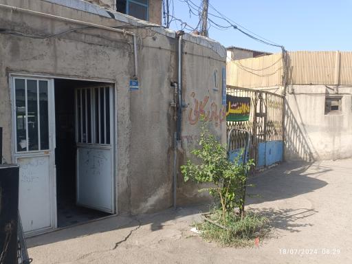 عکس بنگاه توکلی