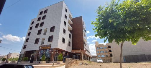 عکس مرکز خرید پوشاک خانواده پوشین