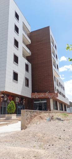 عکس مرکز خرید پوشاک خانواده پوشین