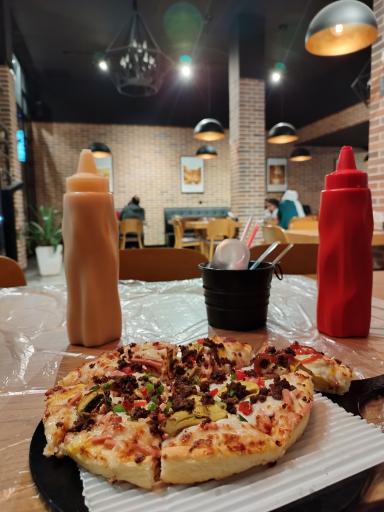 عکس پیتزا مانلی